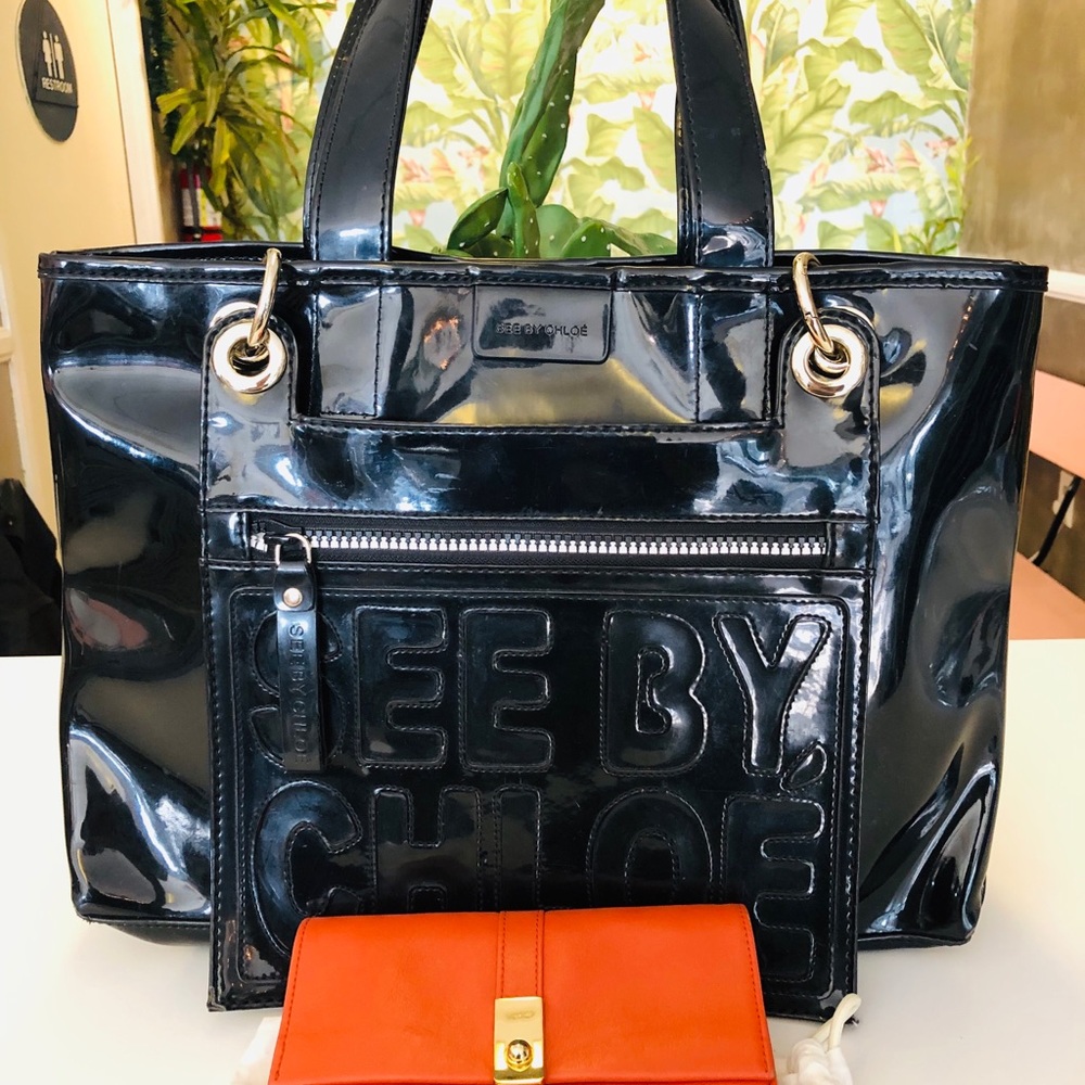 See by Chloe tote bag and long wallet.
